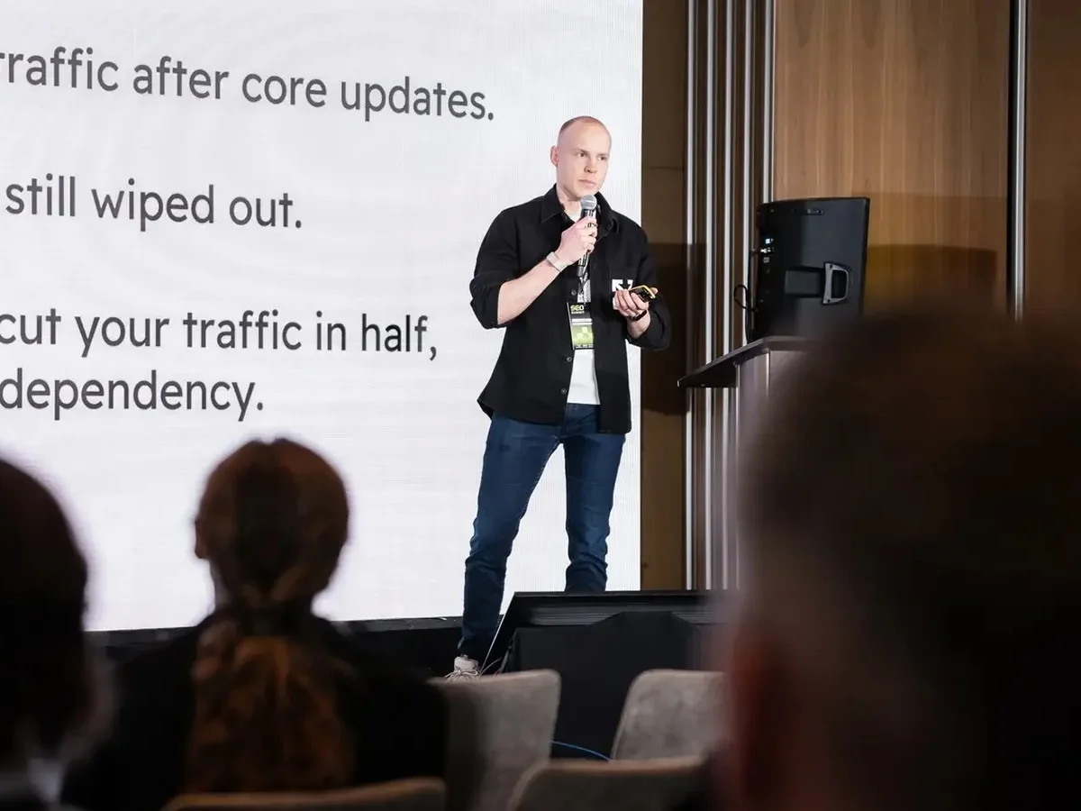 Book Speaking Engagements 5 Vytis Bareika on stage in front of the audience at Baltic-Nordic SEO Summit 2026