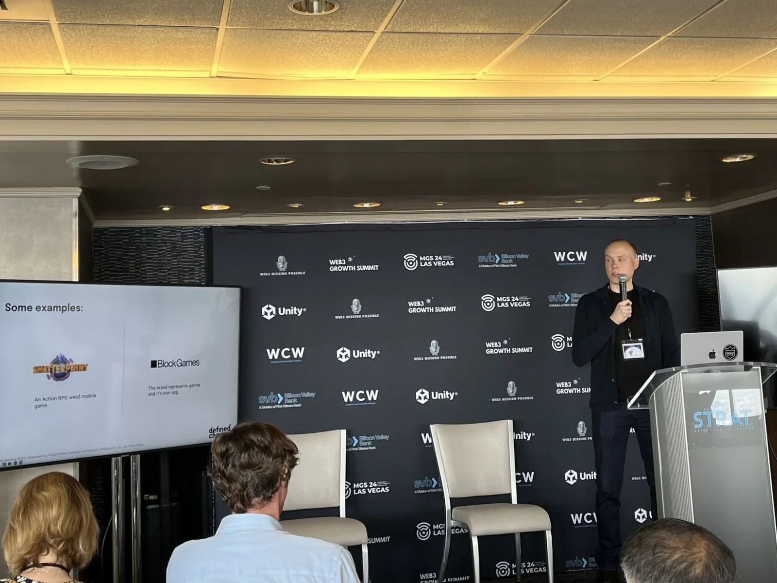 Book Speaking Engagements 1 Vytis Bareika speaking at the lectern at Mobile Growth Summit (MGS 24) in Las Vegas, 2024